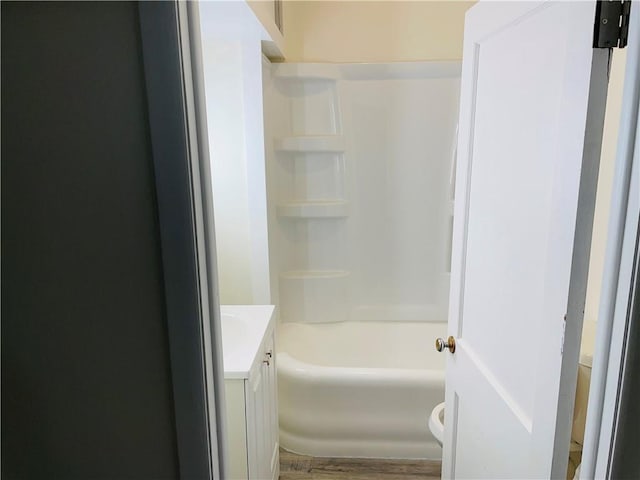 812 N 9th St, Leavenworth, KS 66048 - bathroom featuring vanity, wood finished floors, and bathing tub / shower combination