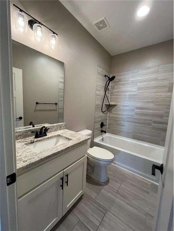 15653 Lakeside Dr, Basehor, KS 66007 - bathroom with vanity and bathtub / shower combination