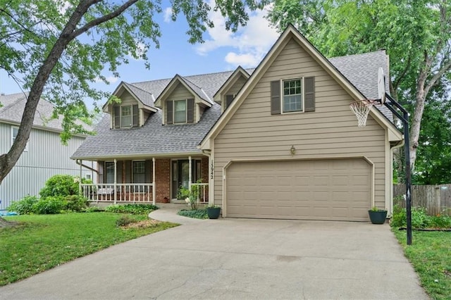 13942 W 113th St, Olathe, KS 66215 - view of front of house featuring covered porch, roof with shingles, driveway, and brick siding