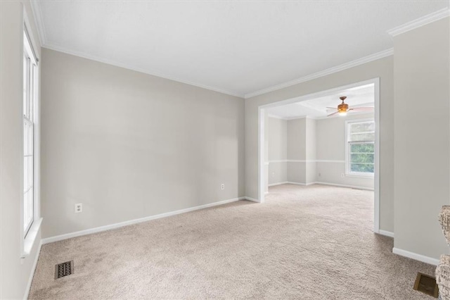 13942 W 113th St, Olathe, KS 66215 - empty room featuring carpet floors, crown molding, and a ceiling fan