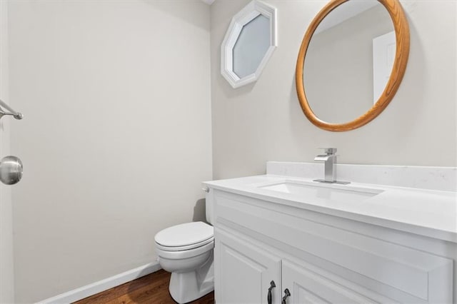 13942 W 113th St, Olathe, KS 66215 - half bath with vanity and wood finished floors