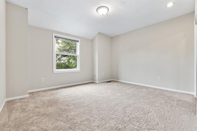 13942 W 113th St, Olathe, KS 66215 - carpeted spare room with a textured ceiling and lofted ceiling