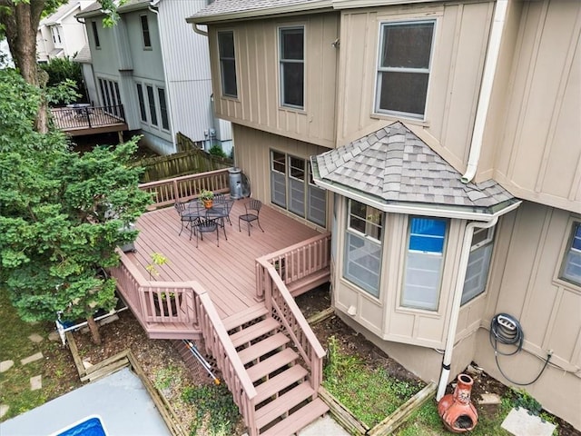 13942 W 113th St, Olathe, KS 66215 - wooden terrace with outdoor dining area