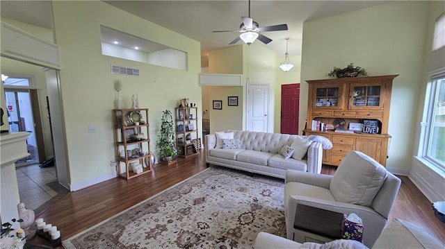 16810 NE 170th Ter, Holt, MO 64048 - living room with ceiling fan, high vaulted ceiling, and dark wood-style flooring
