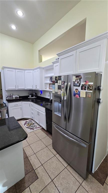16810 NE 170th Ter, Holt, MO 64048 - kitchen featuring stainless steel fridge with ice dispenser, dark countertops, white cabinetry, light tile patterned floors, and recessed lighting