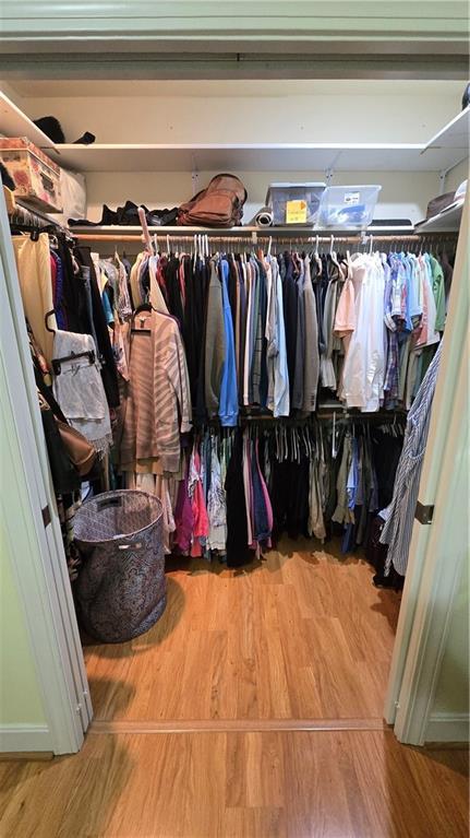 16810 NE 170th Ter, Holt, MO 64048 - walk in closet featuring wood finished floors