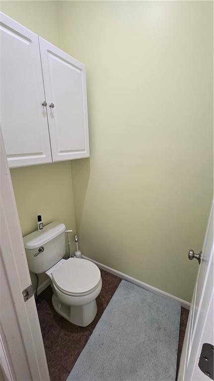 16810 NE 170th Ter, Holt, MO 64048 - bathroom with toilet and baseboards