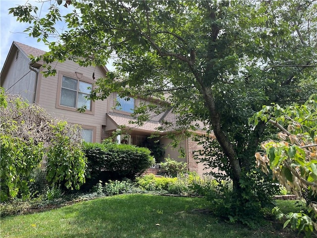 505 Williamsburg Dr, Lees Summit, MO 64063 - view of side of home