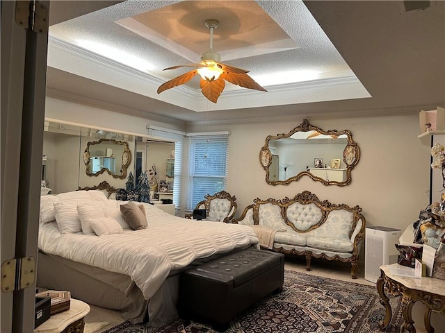 505 Williamsburg Dr, Lees Summit, MO 64063 - bedroom with a raised ceiling, crown molding, and a ceiling fan