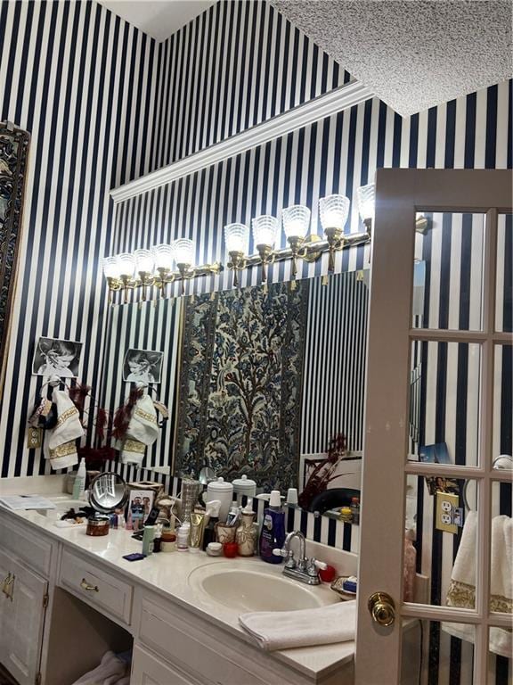 505 Williamsburg Dr, Lees Summit, MO 64063 - bathroom with wallpapered walls and vanity