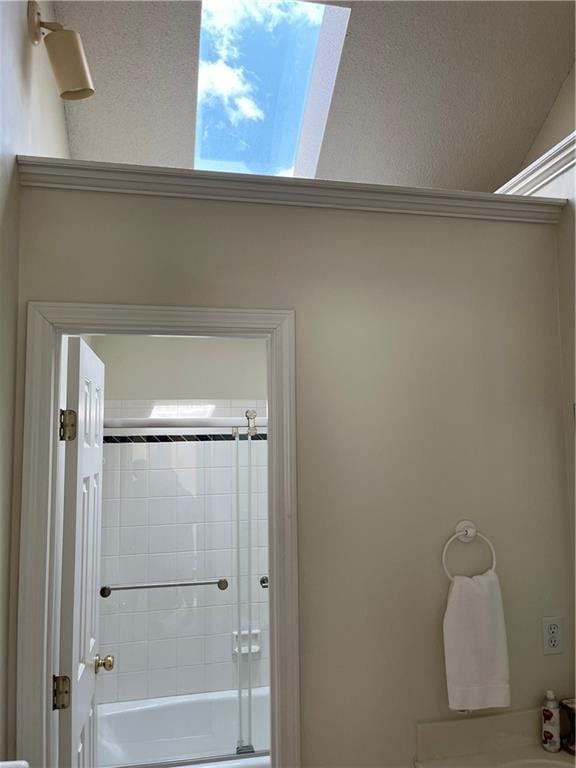 505 Williamsburg Dr, Lees Summit, MO 64063 - bathroom featuring combined bath / shower with glass door