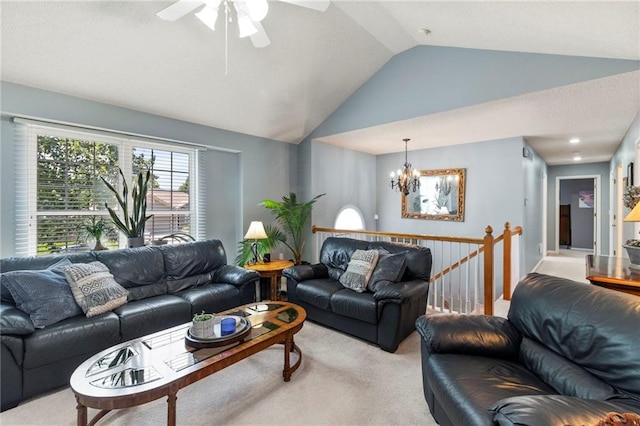 1903 NW Rosewood Dr, Grain Valley, MO 64029 - living area with light colored carpet, lofted ceiling, a ceiling fan, and a chandelier