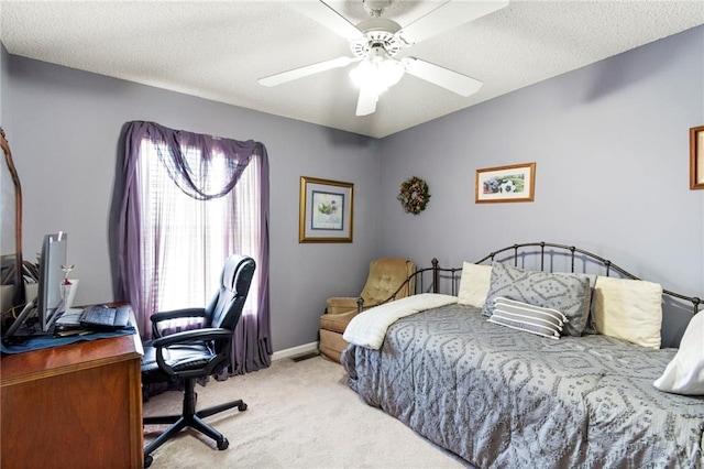 1903 NW Rosewood Dr, Grain Valley, MO 64029 - bedroom featuring light carpet, a desk, and ceiling fan
