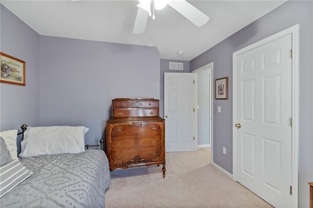 1903 NW Rosewood Dr, Grain Valley, MO 64029 - carpeted bedroom with baseboards and ceiling fan