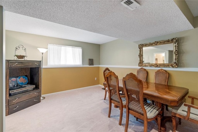 1903 NW Rosewood Dr, Grain Valley, MO 64029 - dining area featuring carpet and a textured ceiling