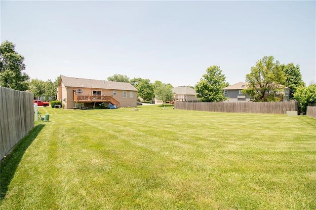 1903 NW Rosewood Dr, Grain Valley, MO 64029 - view of yard featuring a wooden deck