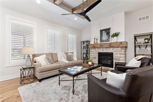 15323 W 171st Ter, Olathe, KS 66062 - living room with wood finished floors, ceiling fan, a glass covered fireplace, and recessed lighting