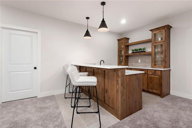 15323 W 171st Ter, Olathe, KS 66062 - bar area featuring hanging light fixtures and light tile patterned flooring