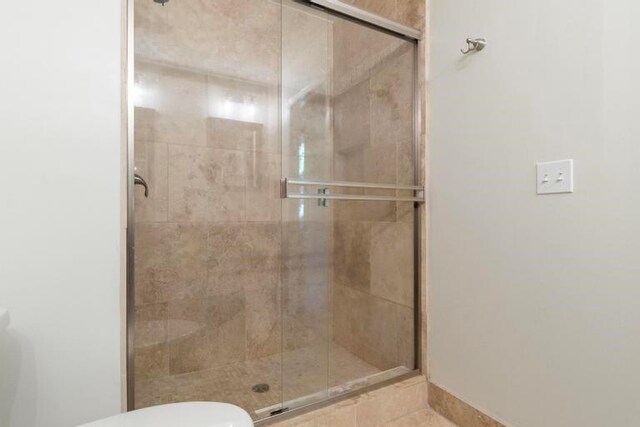 5501 W 86th St, Overland Park, KS 66207 - bathroom with a stall shower and toilet