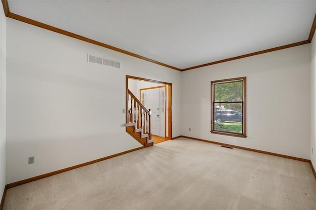 13217 S Locust St, Olathe, KS 66062 - carpeted empty room featuring crown molding and stairway