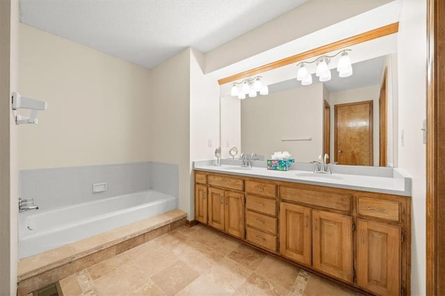 13217 S Locust St, Olathe, KS 66062 - bathroom featuring double vanity and a bath