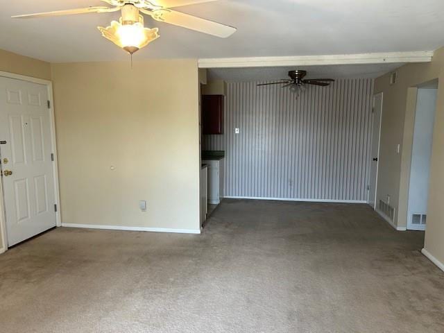 3600 Gabriel Ave Unit 303, Parsons, KS 67357 - unfurnished living room with ceiling fan and carpet