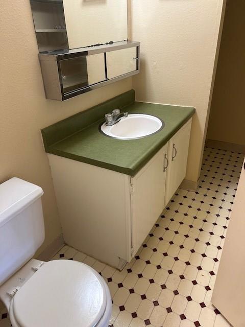 3600 Gabriel Ave Unit 303, Parsons, KS 67357 - bathroom with vanity and tile patterned floors