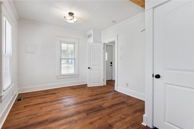 217 W 9th St, Ottawa, KS 66067 - empty room with crown molding and wood finished floors