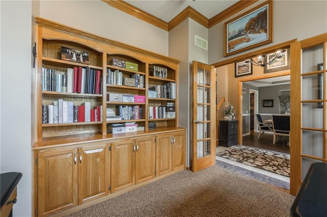 4902 Corinth Dr, Saint Joseph, MO 64506 - living area featuring french doors, ornamental molding, a chandelier, and tile patterned flooring