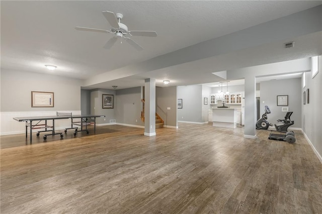 4902 Corinth Dr, Saint Joseph, MO 64506 - rec room with wood finished floors and baseboards