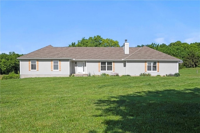23404 Waverly Rd, Spring Hill, KS 66083 - back of property with a yard and a chimney