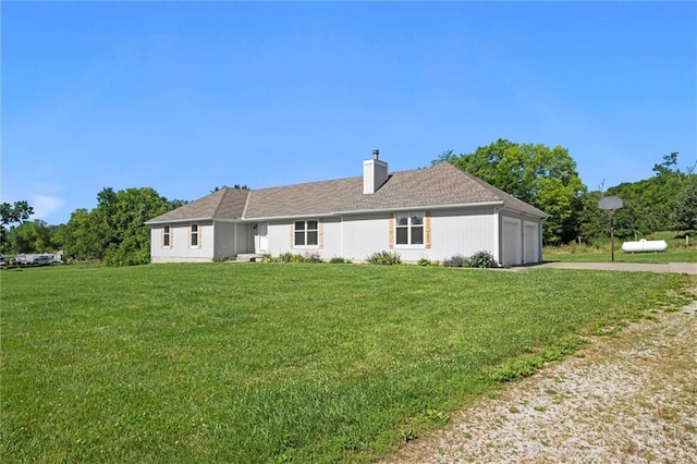 23404 Waverly Rd, Spring Hill, KS 66083 - view of front of property with driveway, an attached garage, a front lawn, and a chimney