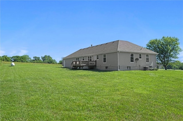 23404 Waverly Rd, Spring Hill, KS 66083 - back of property with a lawn and a deck