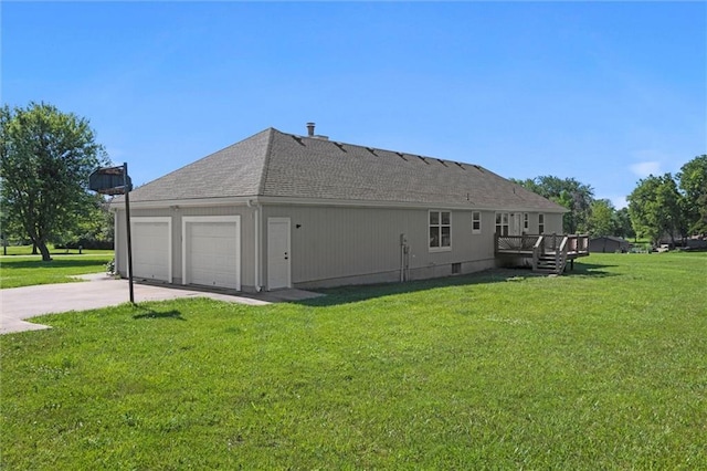 23404 Waverly Rd, Spring Hill, KS 66083 - rear view of house featuring a shingled roof, a lawn, and a deck