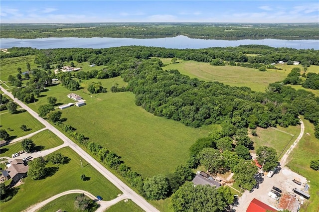 23404 Waverly Rd, Spring Hill, KS 66083 - aerial view of property and surrounding area featuring a nearby body of water and a heavily wooded area