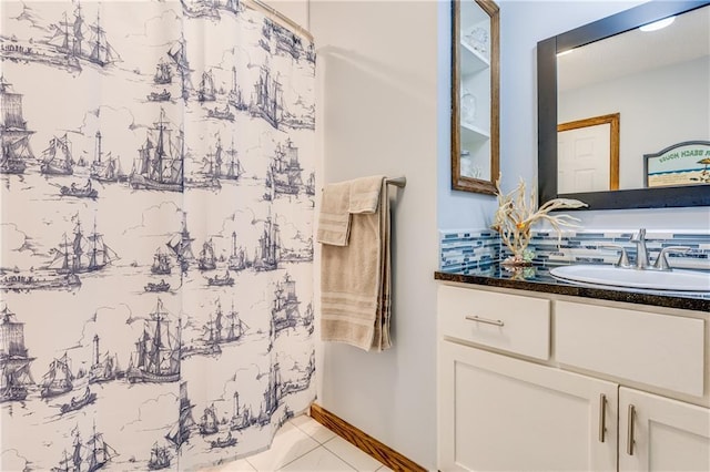 601 W 14th St, Pleasanton, KS 66075 - bathroom with vanity and a shower with shower curtain