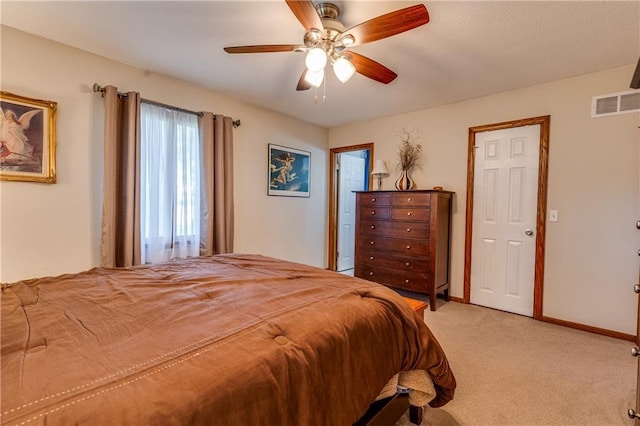 601 W 14th St, Pleasanton, KS 66075 - bedroom featuring light carpet and a ceiling fan