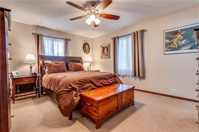 601 W 14th St, Pleasanton, KS 66075 - bedroom featuring light carpet and ceiling fan