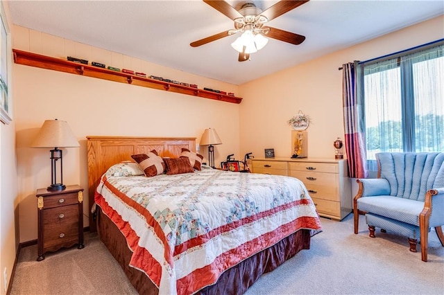 601 W 14th St, Pleasanton, KS 66075 - bedroom with carpet flooring and ceiling fan