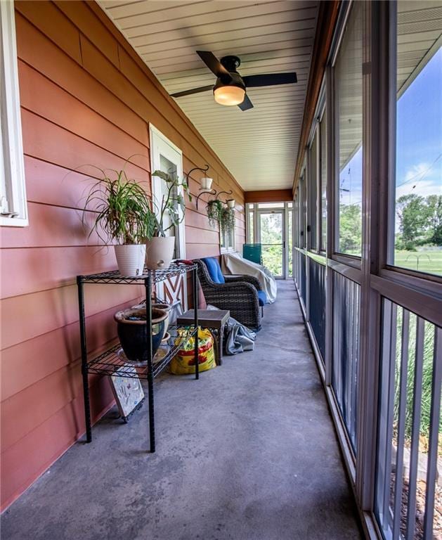 601 W 14th St, Pleasanton, KS 66075 - sunroom / solarium featuring ceiling fan