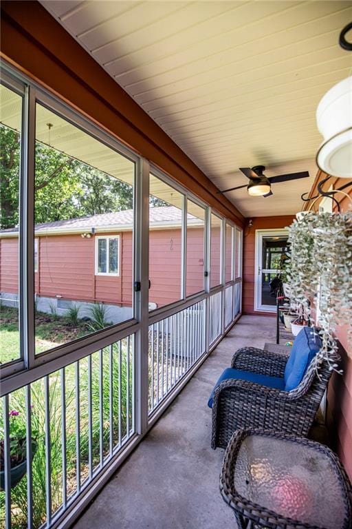 601 W 14th St, Pleasanton, KS 66075 - sunroom with a ceiling fan