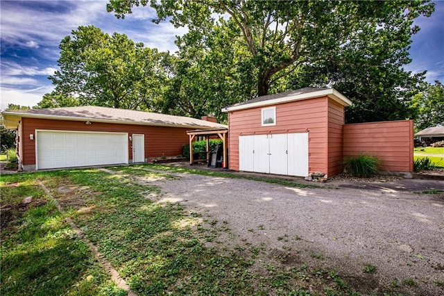 601 W 14th St, Pleasanton, KS 66075 - view of detached garage
