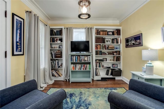 6033 Central St, Kansas City, MO 64113 - sitting room featuring crown molding and wood finished floors