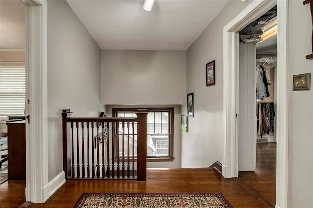 6033 Central St, Kansas City, MO 64113 - entrance foyer with wood finished floors and baseboards