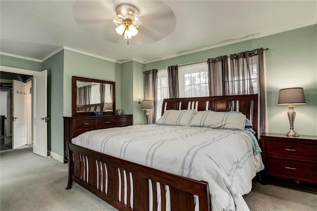 6033 Central St, Kansas City, MO 64113 - carpeted bedroom featuring crown molding and a ceiling fan