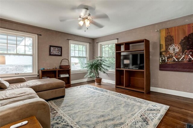 6033 Central St, Kansas City, MO 64113 - living room featuring ceiling fan and wood finished floors
