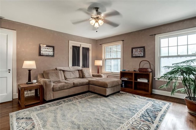 6033 Central St, Kansas City, MO 64113 - living room featuring ceiling fan and wood finished floors