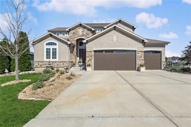 1401 Spurlock Cv, Raymore, MO 64083 - french country style house featuring stone siding, stucco siding, a garage, concrete driveway, and a front lawn