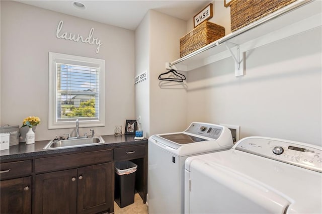 1401 Spurlock Cv, Raymore, MO 64083 - washroom with washer and clothes dryer and cabinet space