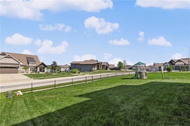 1401 Spurlock Cv, Raymore, MO 64083 - view of yard with a residential view
